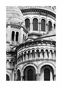 Black-and-white photo of a domed stone building with arches and ornate columns