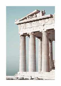 Close-up of an ancient Greek temple with marble columns against a clear blue sky