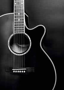 Close-up of a black acoustic cutaway guitar against a dark background