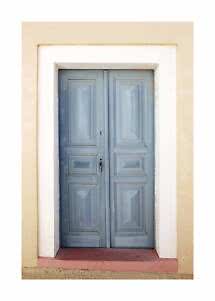Light blue wooden double door set in a cream wall with white trim