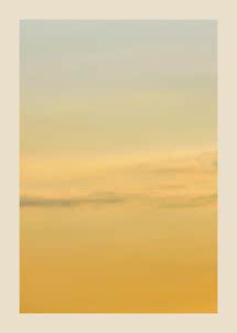 Abstract scene of golden sky with soft clouds and a warm color gradient