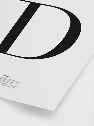 Minimalist typography poster with a large black letter D on a white background.