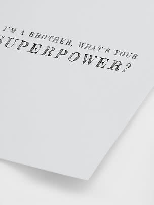 Weißes Poster mit schwarzem Text: „I’m a brother, what’s your superpower?”