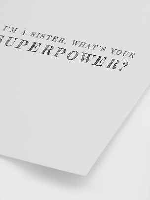 Weißes Poster mit schwarzem Text: “I’m a sister, what’s your superpower?”