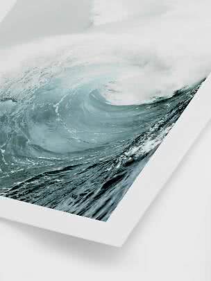 Framed art print of a large blue ocean wave with white foam