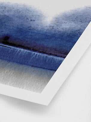 Close-up of framed abstract watercolor print in blue and white tones