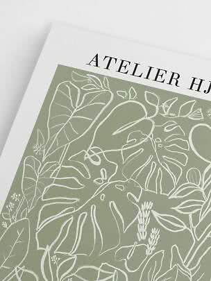 Nærbillede af botanisk plakat med hvide bladtegninger på lysegrøn baggrund