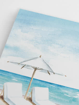 Watercolor of two beach chairs and an umbrella by the sea