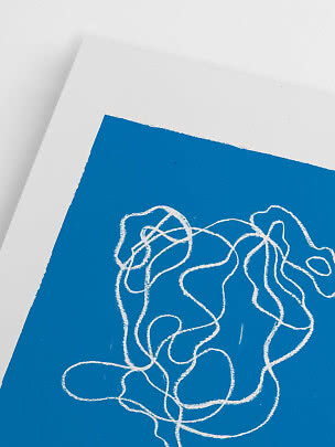Close-up of abstract print with white squiggle lines on a blue background