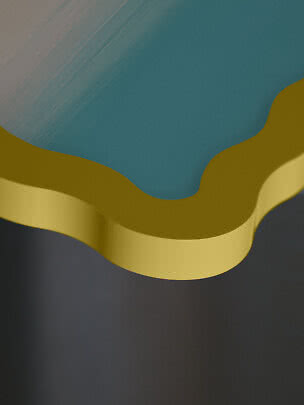 Close-up of a wavy layered surface in blue, yellow and dark gray