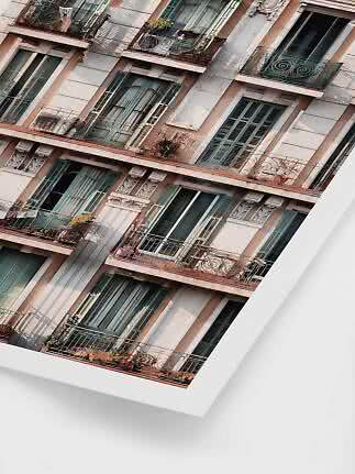 Tilted photo of an apartment facade with balconies, green shutters, and potted plants