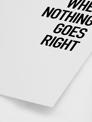 Hvid plakat med sort skrå tekst: "When nothing goes right"