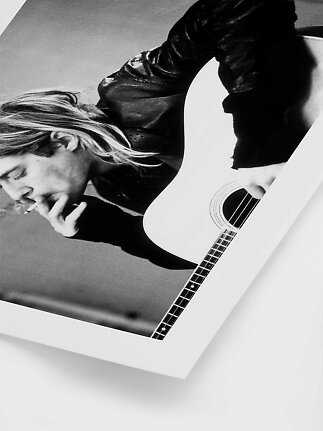 Black-and-white poster of a long-haired person in a leather jacket with cigarette and acoustic guitar