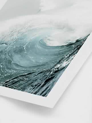 Framed art print of a large blue ocean wave with white foam