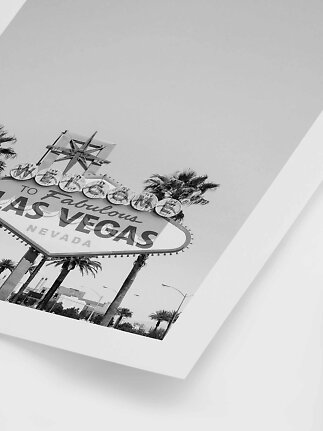 Sort-hvid plakat med Welcome to Fabulous Las Vegas-skilt og palmer