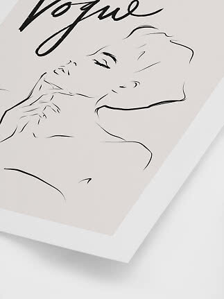 Framed minimalist line drawing of a woman's face with "Vogue" at the top