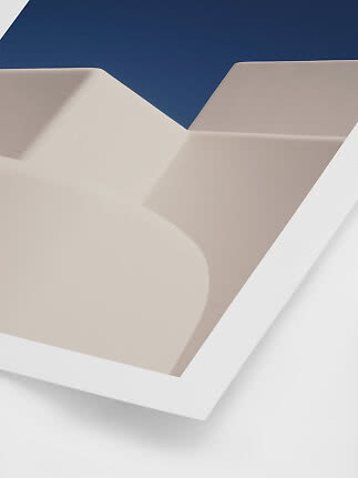 Abstract wall art with beige geometric shapes on a dark blue background in a white frame