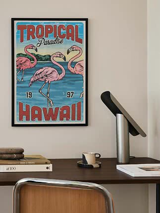 Framed vintage poster with pink flamingos and the text "Tropical Paradise Hawaii"