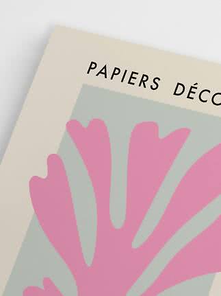Close-up of art print with pink botanical shape on pale green background and PAPIERS DÉCO text