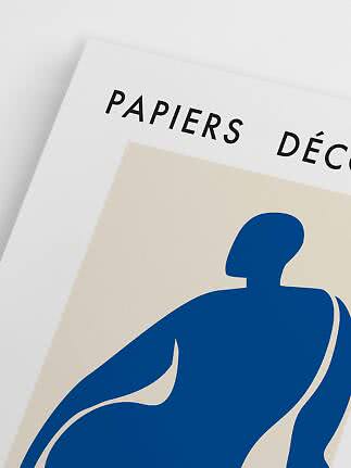 Close-up of art poster with blue abstract figure and text "PAPIERS DÉCO"