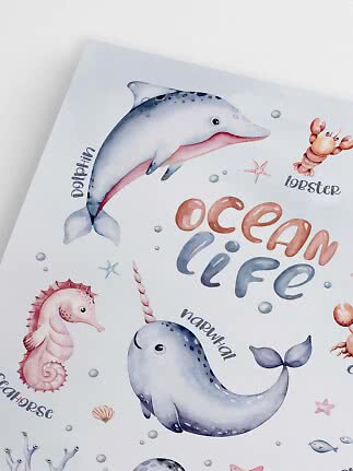 Poster with watercolor sea animals and the text Ocean Life, including dolphin, narwhal, seahorse and lobster