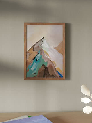 Peinture abstraite encadrée de montagne, tons beige, brun et turquoise, accrochée au mur