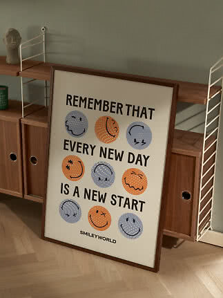 Poster SmileyWorld incorniciato con faccine colorate e frase motivazionale