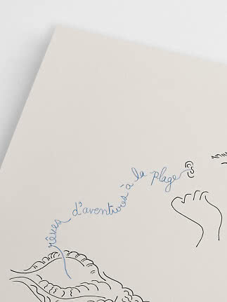Close-up of cream-colored print with blue handwritten text and simple black line drawings