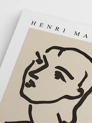 Nærbillede af Henri Matisse-plakat med abstrakt ansigt i sorte linjer på beige baggrund