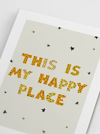 Poster with the text "This is my happy place" in yellow letters and small stars
