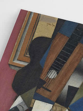 Close-up of a cubist painting with a black guitar and geometric shapes in red, blue and brown