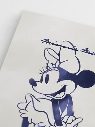 Nahaufnahme von weißem Stoff mit dunkelblauem Minnie-Maus-Print