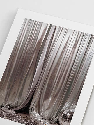 Close-up of the unframed print showing the wide white margin, the glitter texture of the lamé and the mirror ball at lower right