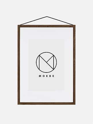 Brown wooden frame with white mat and black hanging cord, shown front view.
