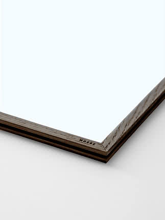 Close-up of square mirror with slim dark oak wooden frame
