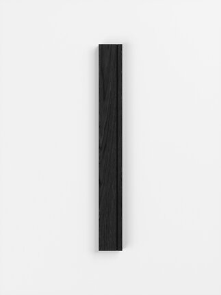 Black vertical wood-look cabinet handle on white background