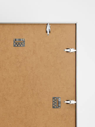 Back of silver frame with MDF board and metal wall hanging clips
