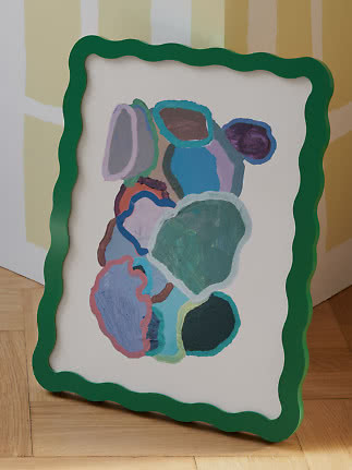 Abstract painting with wavy green frame and colorful organic shapes on a white background