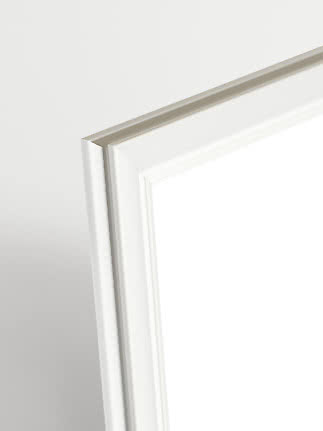 Close-up of white Madeleine picture frame with profiled edge