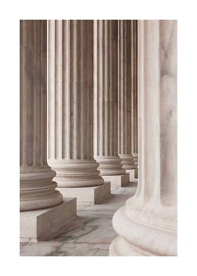 Row of fluted marble columns in light beige and gray tones