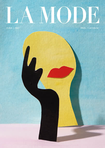 La Mode-Cover mit stilisiertem gelbem Profil, roten Lippen und schwarzer Hand vor blauem Hintergrund