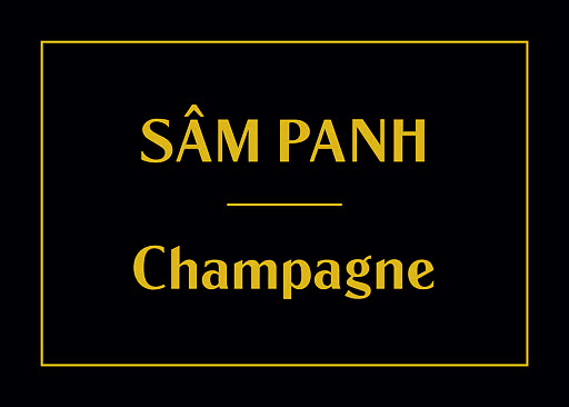 Black label with gold border and the words “SÂM PANH” and “Champagne” in gold