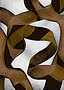 Looping bands of olive and warm caramel over black against a speckled pale grey that reads almost white