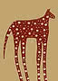 A long-legged animal painted in deep rust and covered in irregular cream dots, standing in profile on a warm sand ground with its legs running off the lower edge