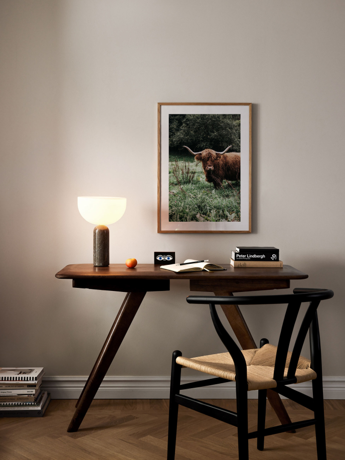 Cow in the Grass Poster
